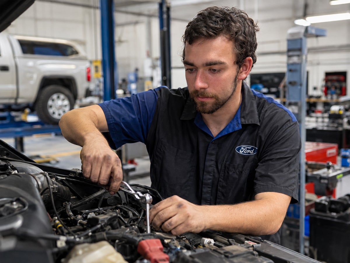 Eck Tech automotive apprentice working inside the Rusty Eck Ford service department